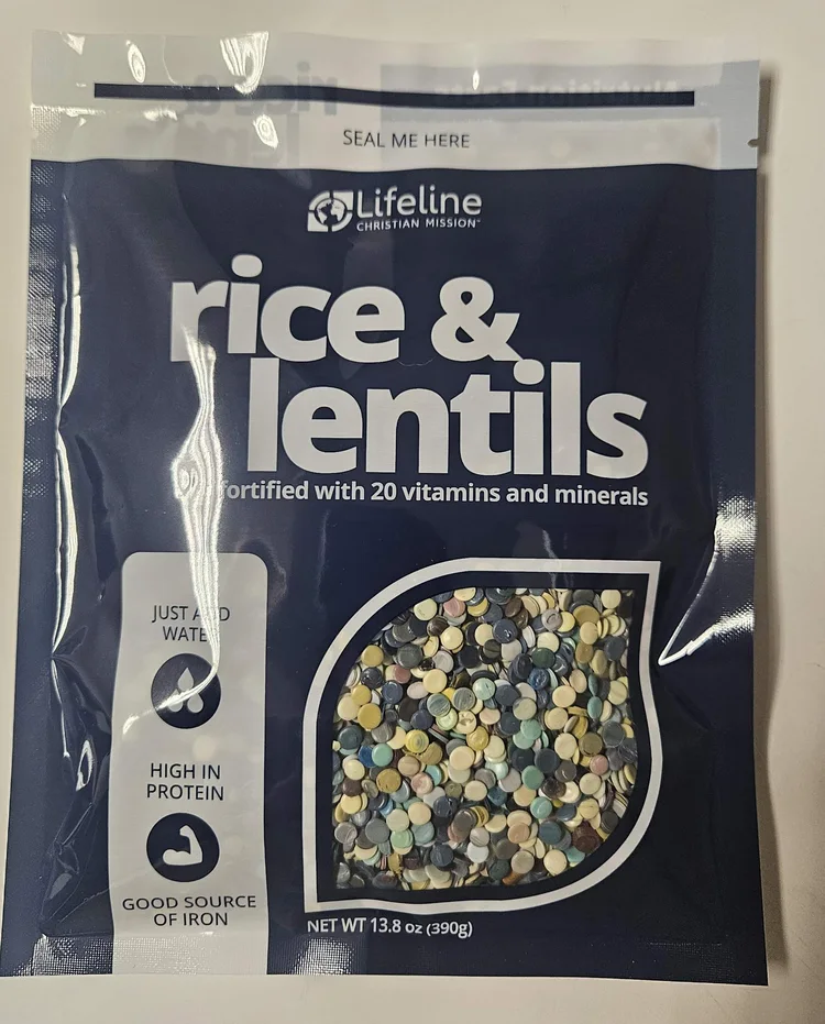 Printed three side seal pouch with a clear product window, filled with a dry rice and lentil mix